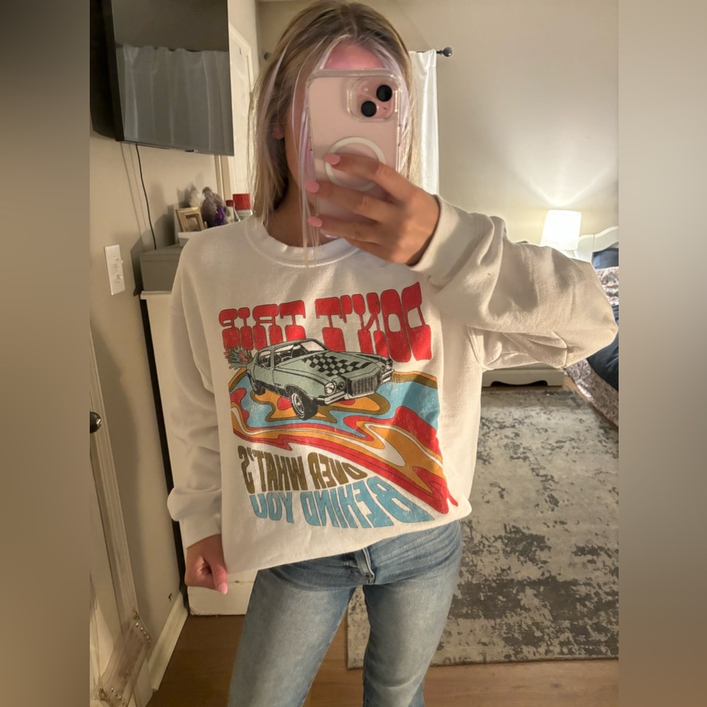 “ DONT TRIP OVER WHATS BEHIND YOU” CREWNECK